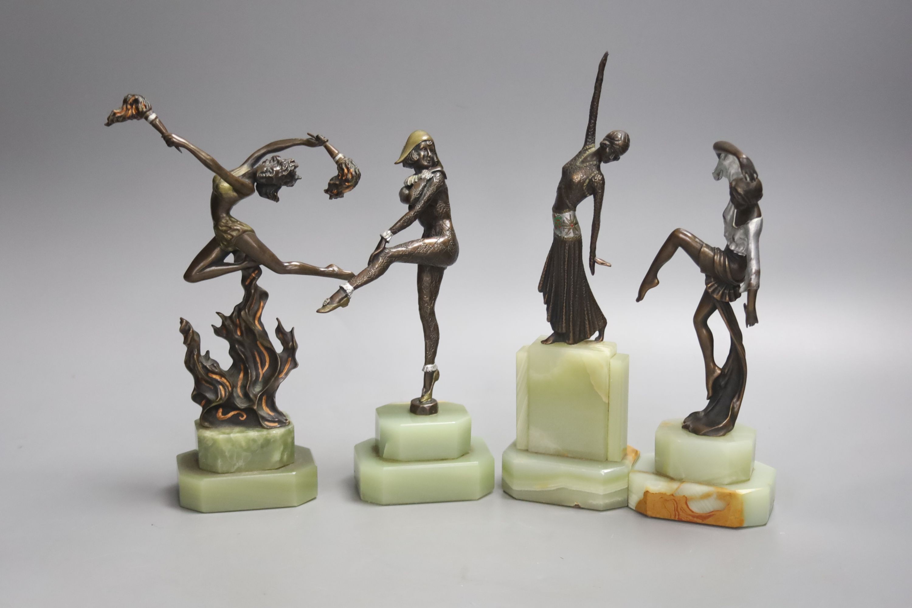 A group of four Art style bronze and oynx dancers, tallest 21.5cm